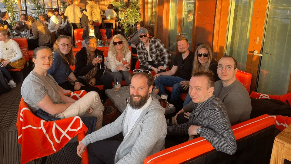 Colleagues on a sunny terrace after work